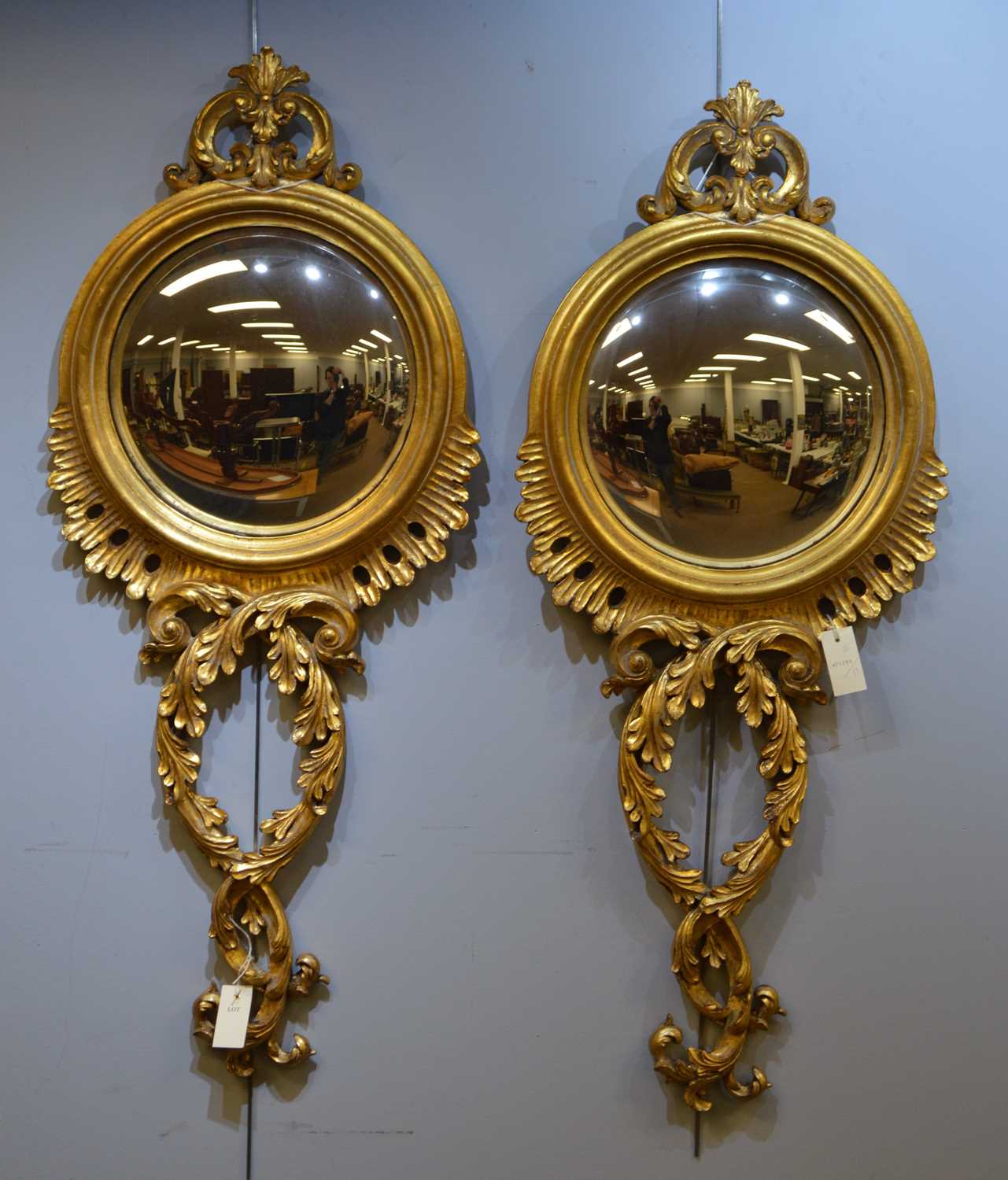Lot 563 - A pair of modern convex mirrors.