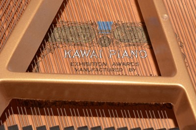 Lot 744 - K. Kawai black lacquered baby grand piano and stool.