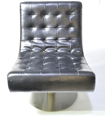 Lot 60 - Modern design swivel easy chair.