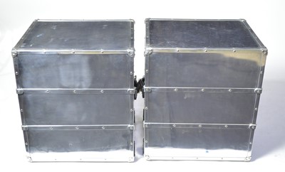 Lot 63 - Attributed to Andrew Martin: a pair of steel and leather chests.