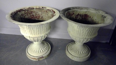 Lot 548 - A pair of cast metal urns