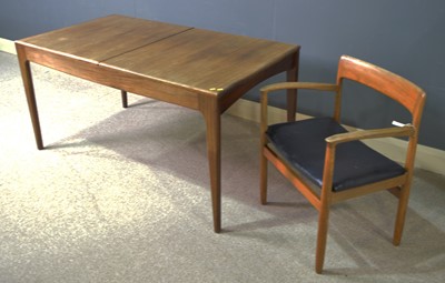 Lot 80 - 1960's teak extending dining table; and a carver chair.