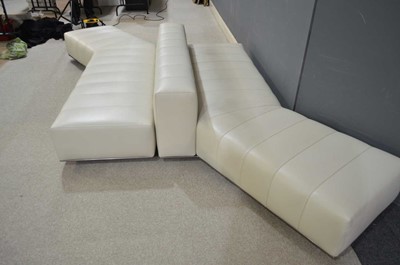 Lot 62 - Attributed to Minotti: two cream leather angular seating units.