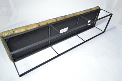Lot 64 - A faux leather button upholstered bench.