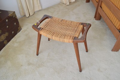 Lot 128 - A mid Century teak and woven stool.