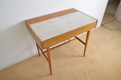 Lot 131 - A mid 20th Century side table/desk.
