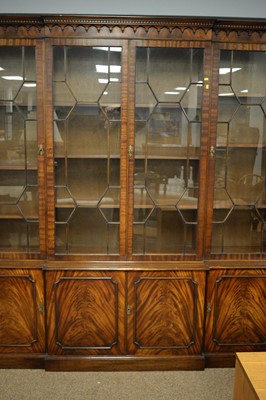 Lot 118 - Reprodux George III style mahogany breakfront library bookcase.