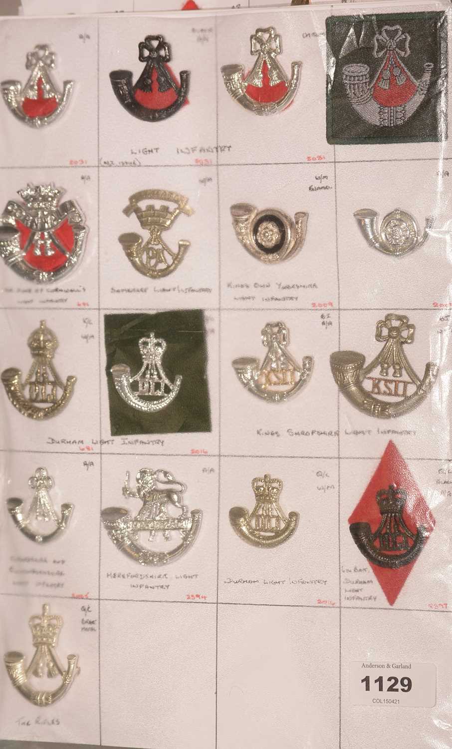 Lot 1129 - A collection of 17 Regimental Infantry cap badges.