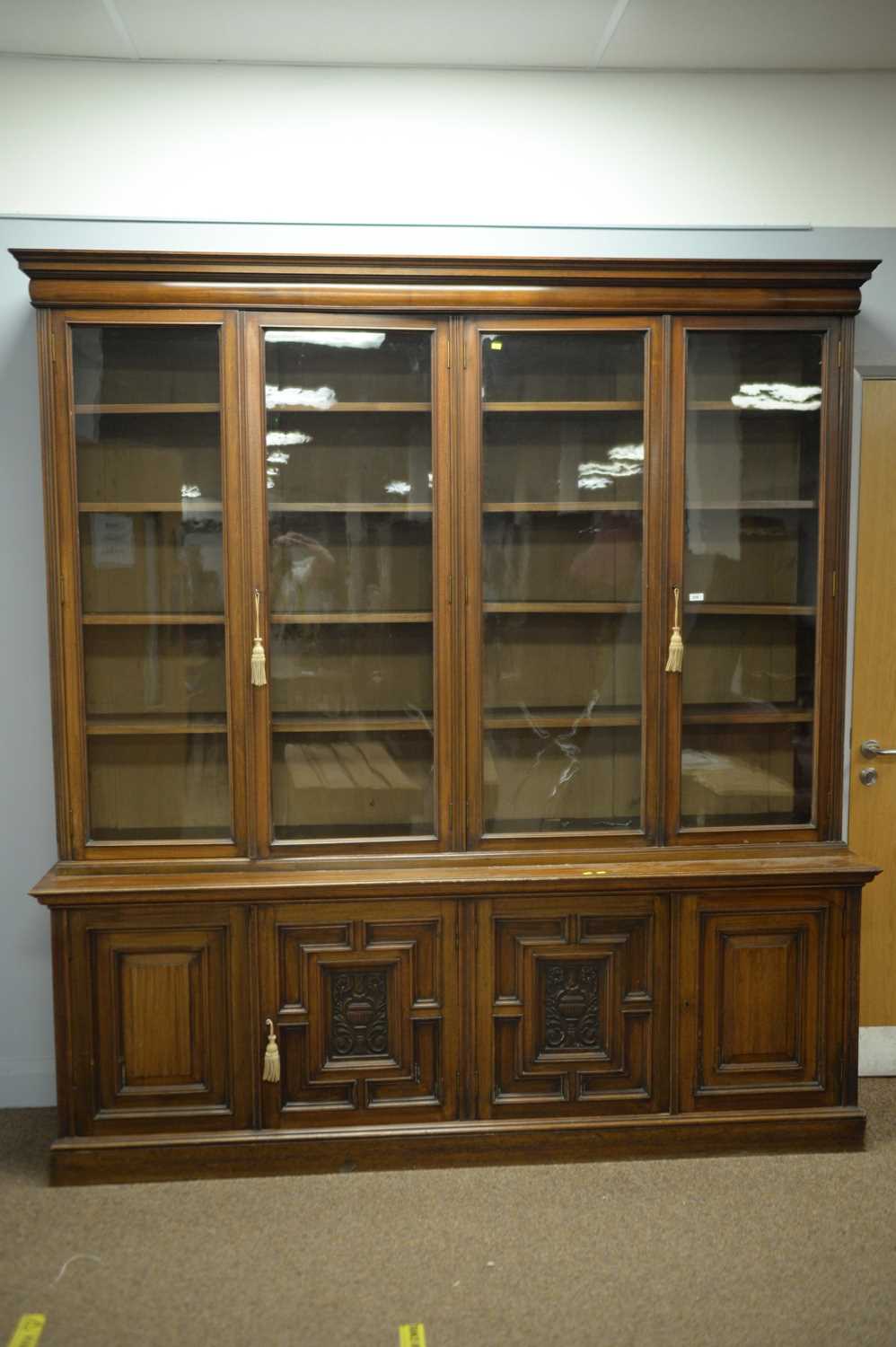 Lot 230 - Early 20th C walnut bookcase.