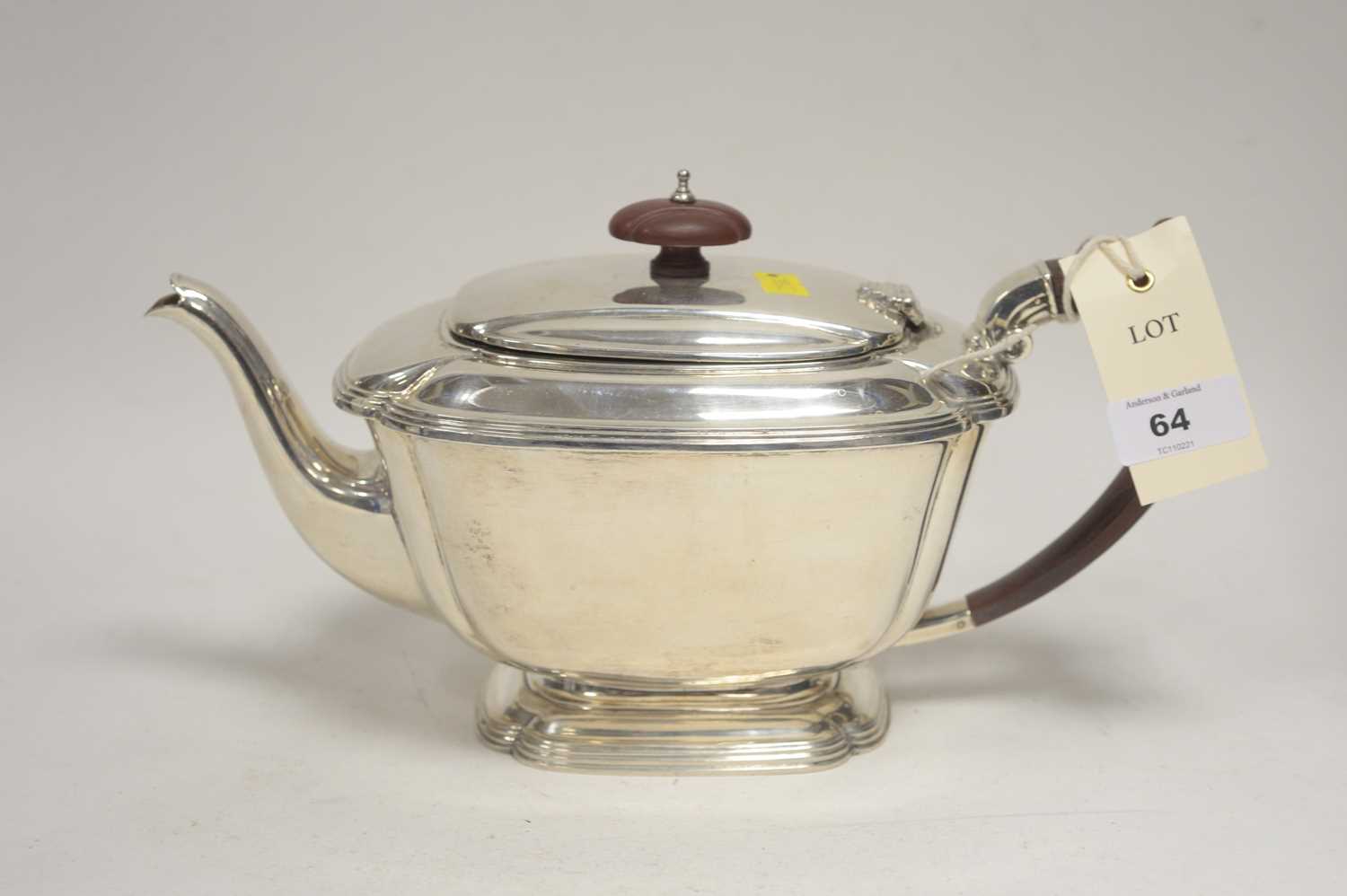 Lot 64 - A silver teapot.