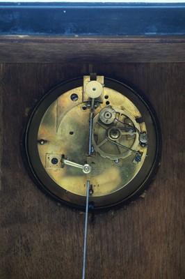 Lot 765 - A 19th Century inlaid ebonised mantel clock.