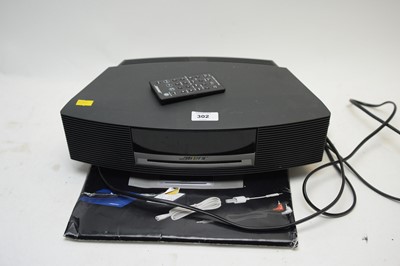 Lot 302 - A Bose CD player wave music system.