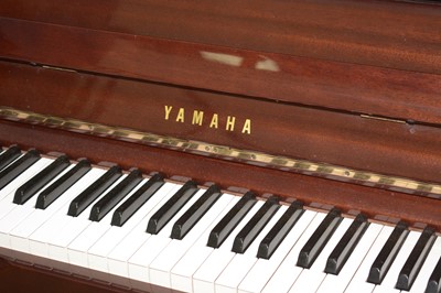 Lot 745 - Yamaha upright grand piano.