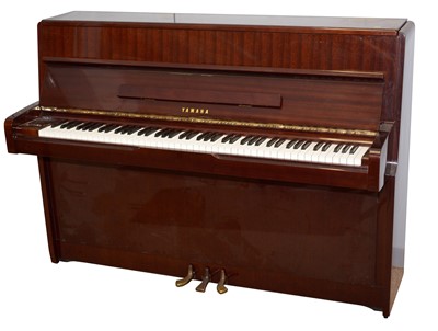 Lot 745 - Yamaha upright grand piano.