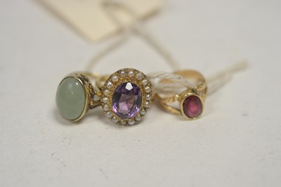 Lot 80 - Three gem set rings.