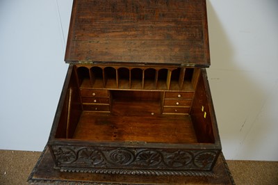 Lot 115 - 17th Century carved oak bible box.