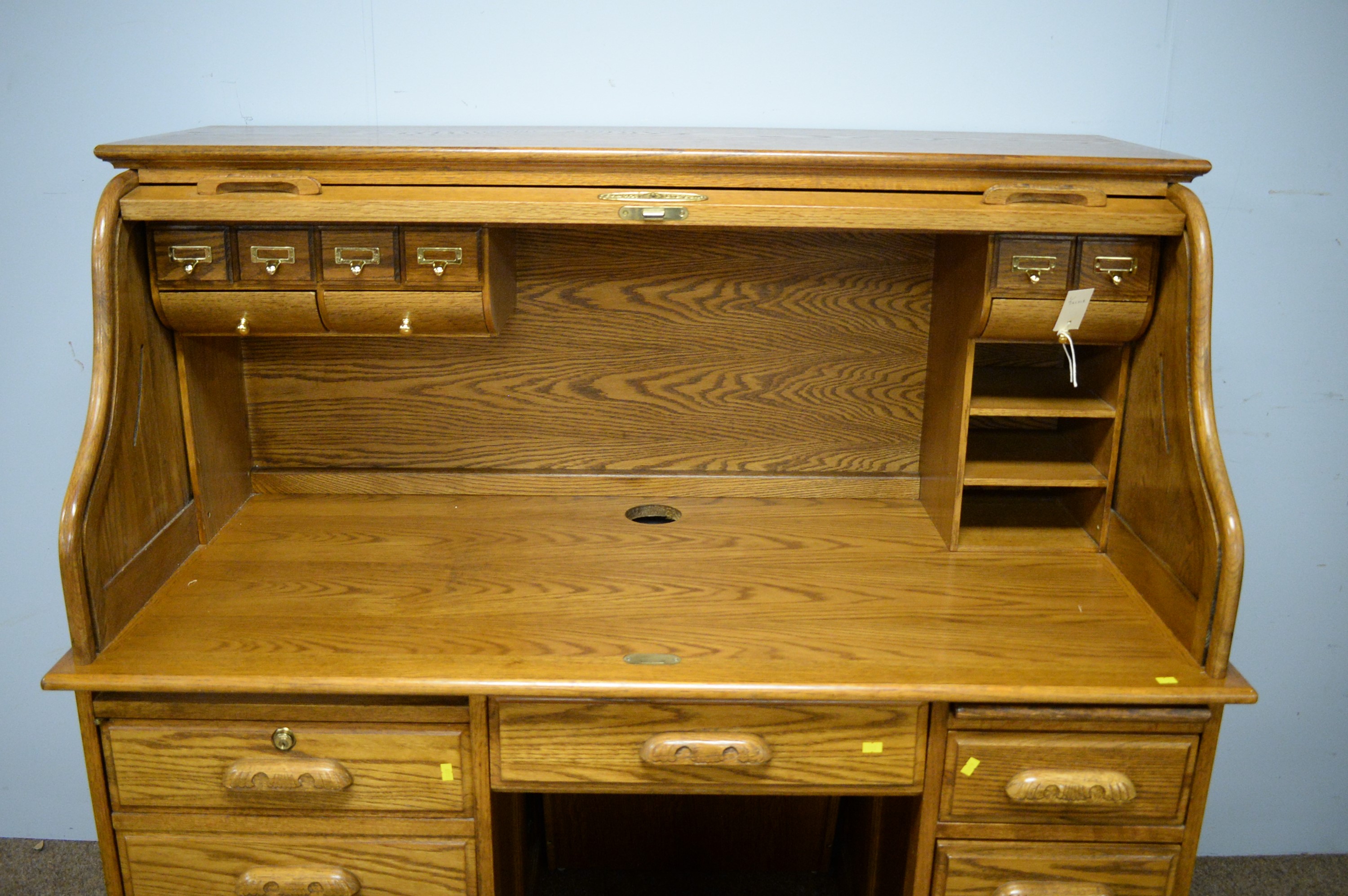 Lot 123 20th Century reproduction oak roll top desk