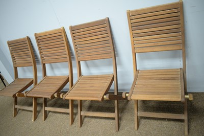Lot 90 - 20th Century teak garden table and four chairs
