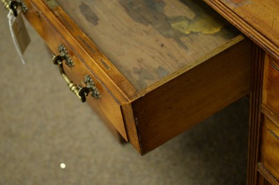 Lot 27 - A walnut pedestal desk