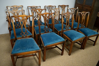 Lot 88 - Chapmans: twelve chairs and a twin pedestal dining table.