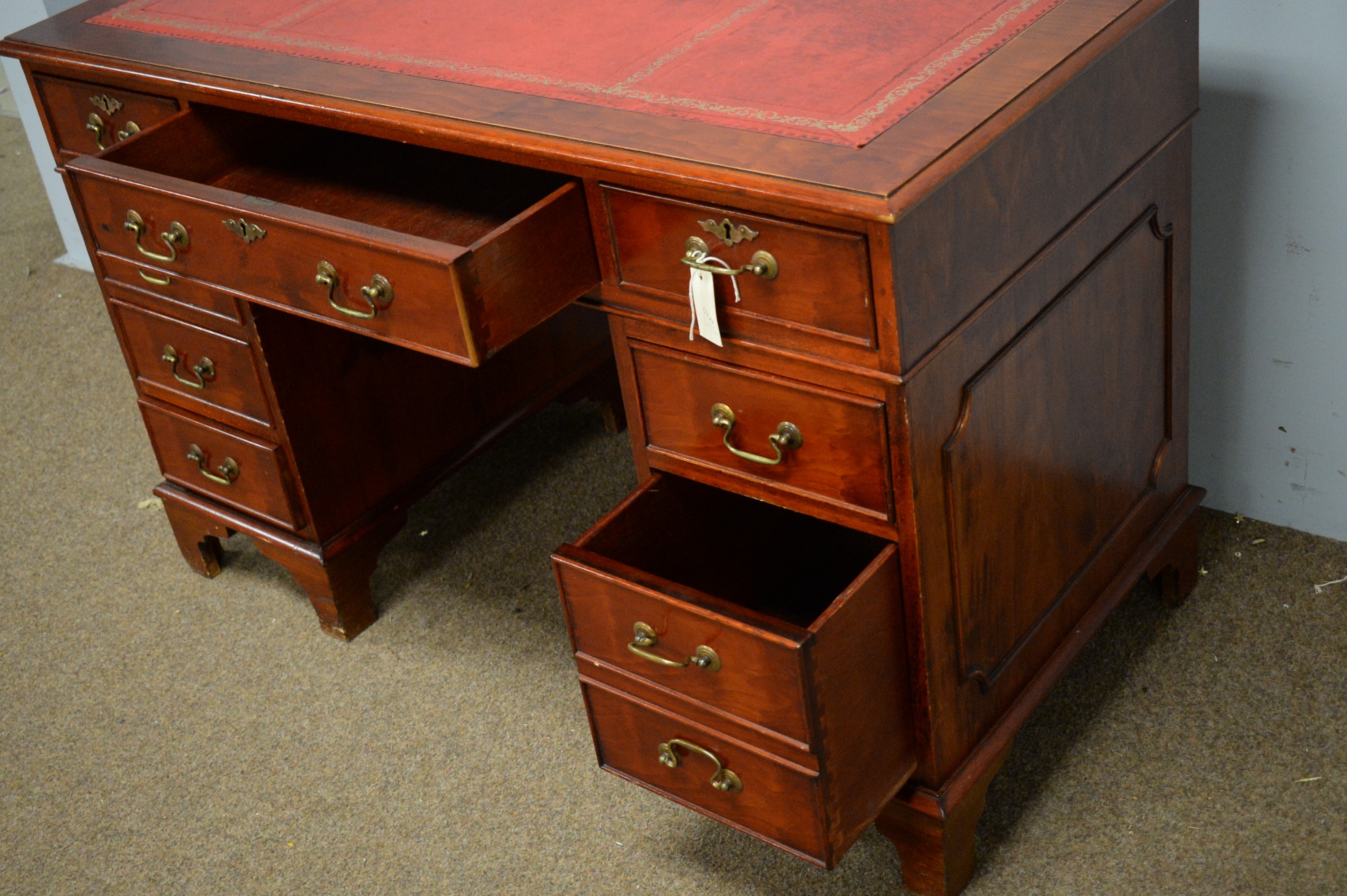 Lot 95 20th Century stained yew wood pedestal desk