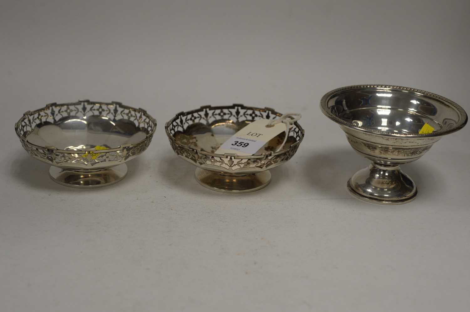 Lot 359 - A pair of silver bon bon dishes; and another.