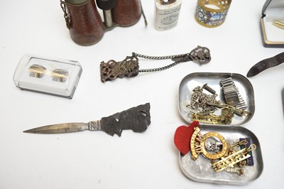 Lot 409 - Military badges belts and field glasses; and other items