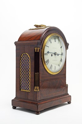 Lot 760 - A Regency mahogany mantel clock.