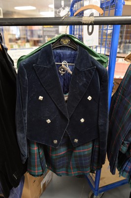 Lot 499 - A tartan kilt and jacket and silver brooch