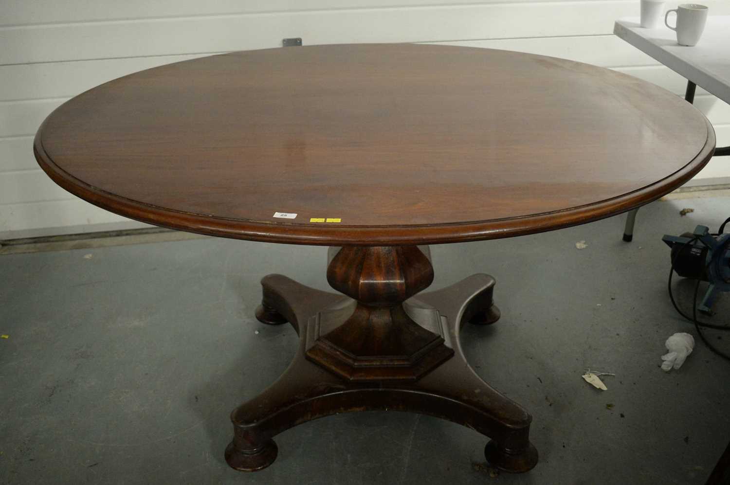 Lot 25 - Victorian mahogany tilt action dining table.