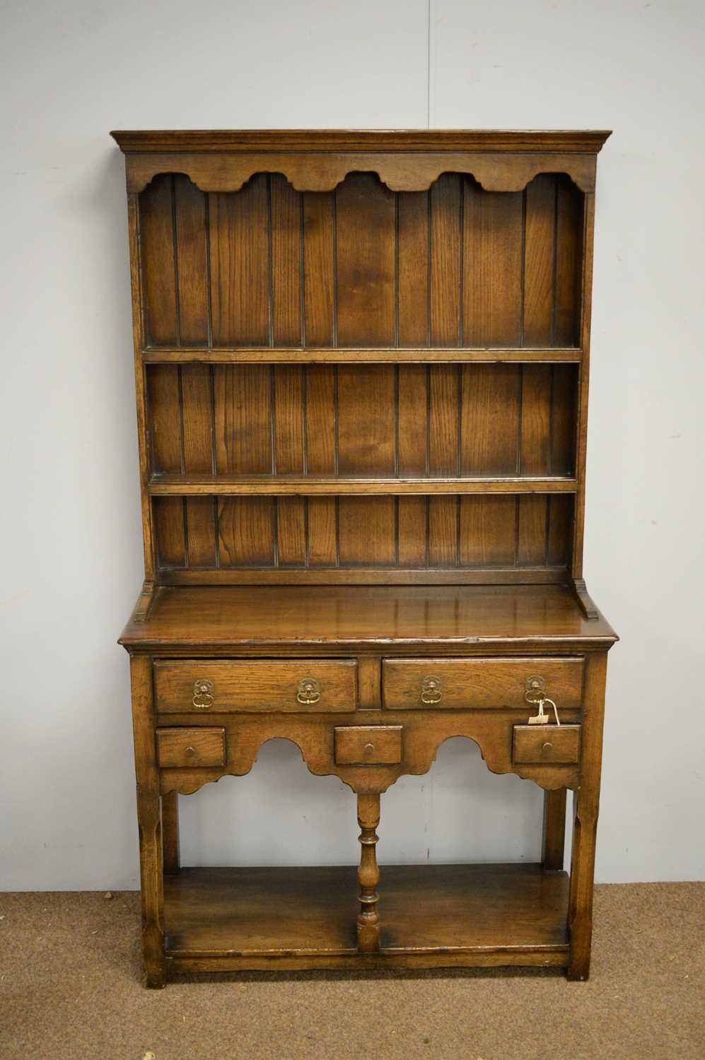Lot 1 - Reproduction Georgian style oak dresser.