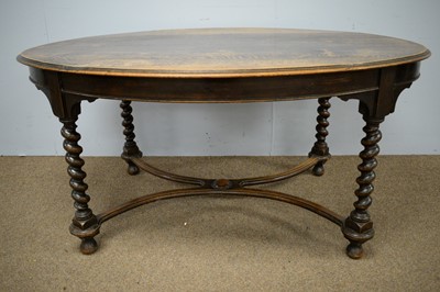 Lot 65 - 1920's oak oval dining table.