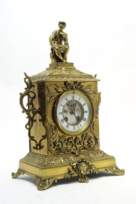Lot 762 - An early 20th C brass-cased mantel clock.