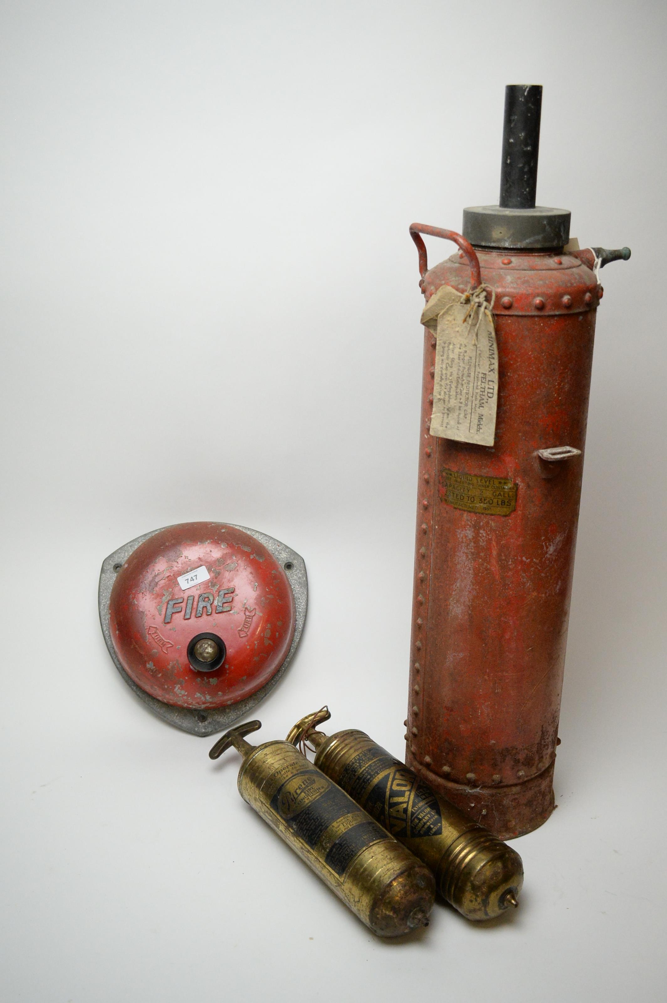 Lot 747 Three vintage fire extinguishers; and a wall