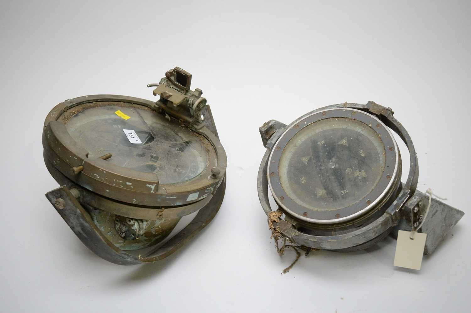 Lot 751 - Two ship's compasses.