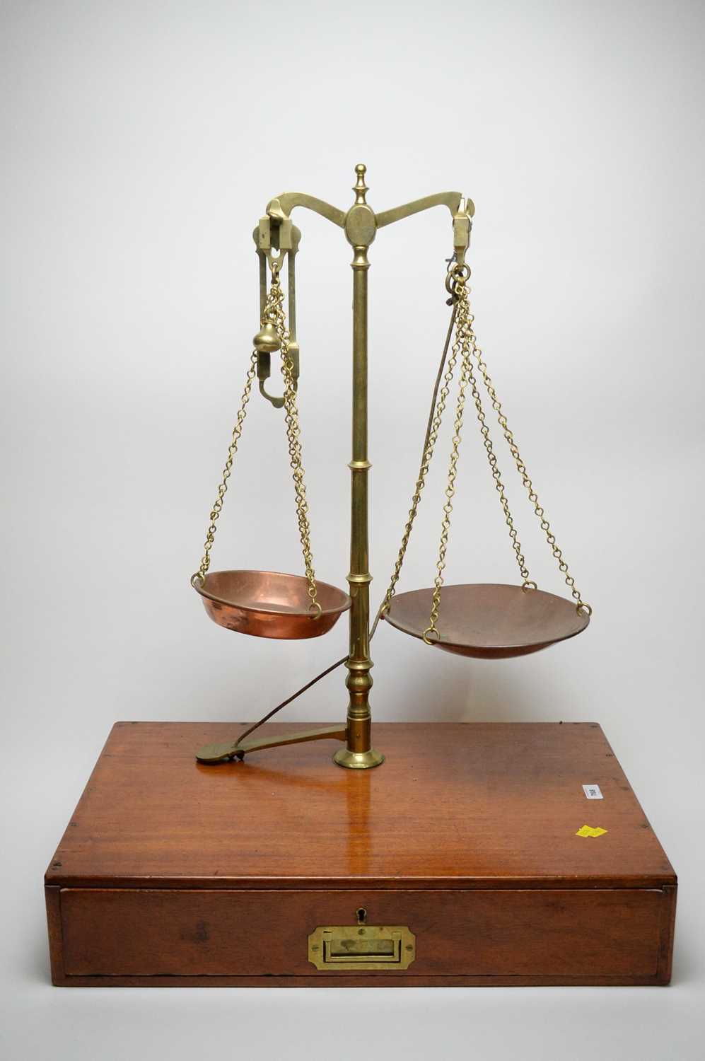 Lot 768 - A set of brass balance scales.
