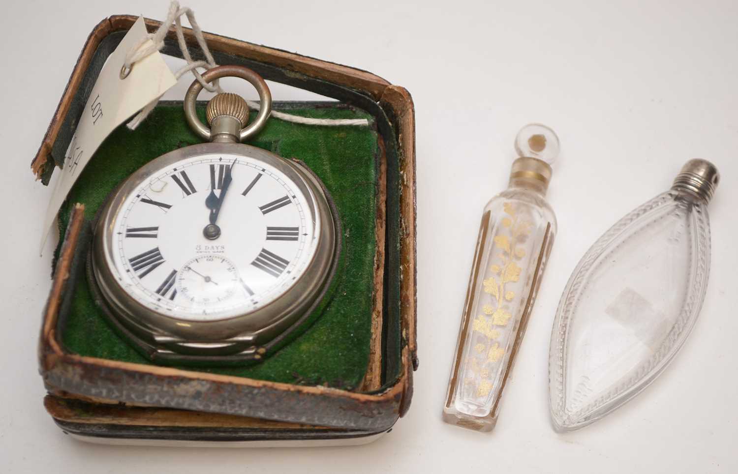Lot 245 - Goliath pocket watch, cased, and two scent bottles.
