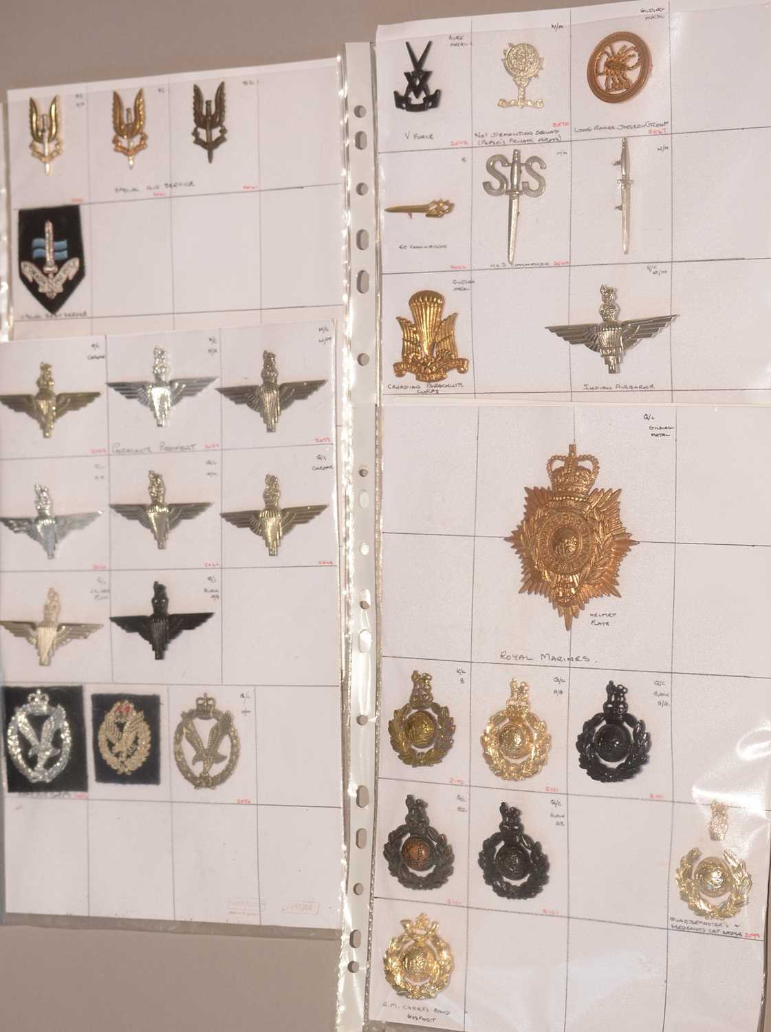 Lot 1136 - A collection of 31 Special Forces cap badges.