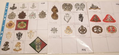 Lot 1148 - A collection of 28 Regimental cap badges.