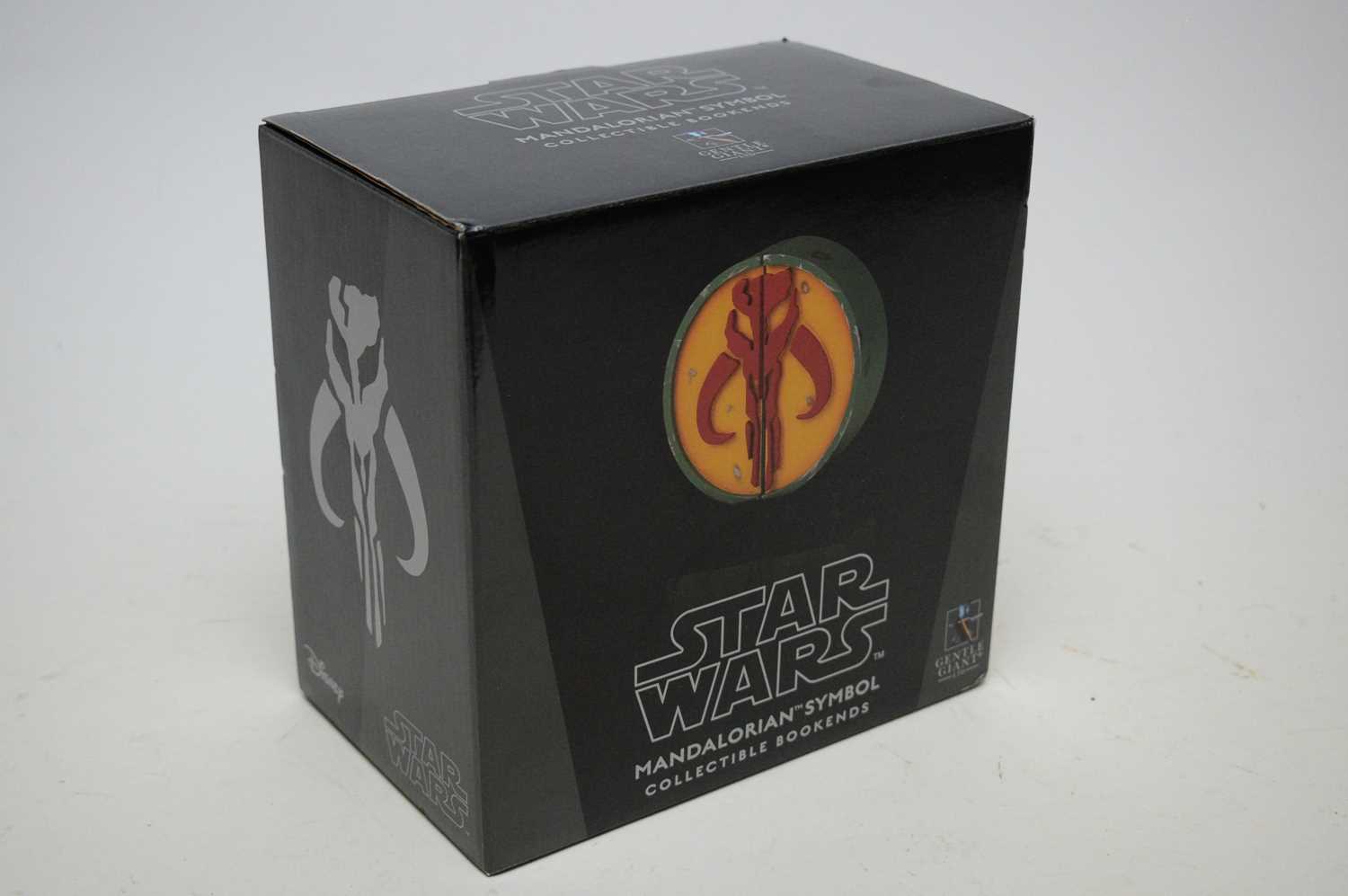 Lot 1003 - Star Wars Gentle Giant Mandalorian Symbol bookends