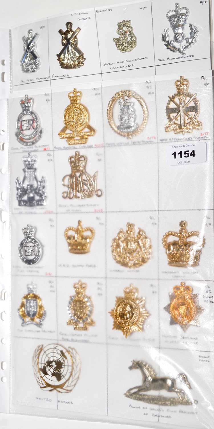 Lot 1154 - A collection of 14 mixed Military cap badges.