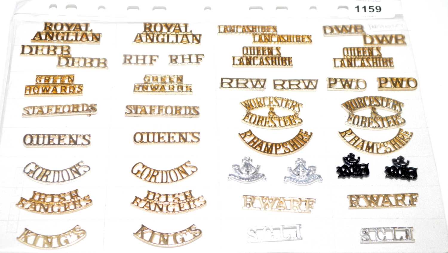 Lot 1159 - A collection of 20 pairs of Infantry shoulder titles.