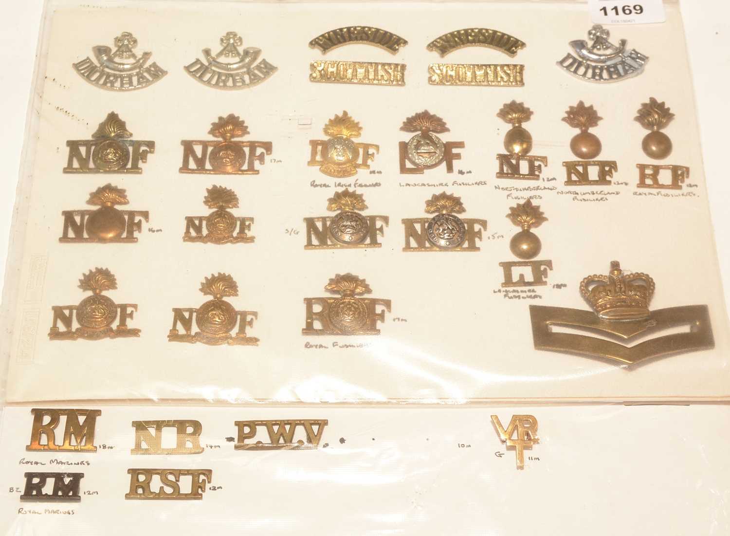 Lot 1169 - A collection of 26 mainly Infantry metal shoulder titles.