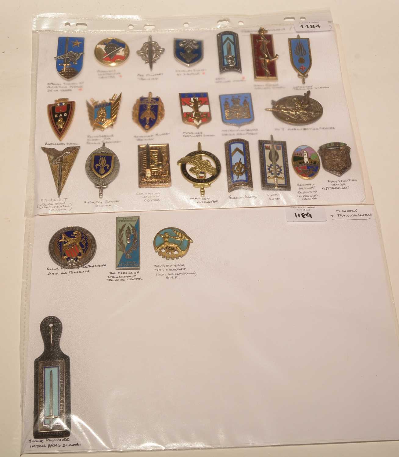 Lot 1184 - A collection of 25 French enamel School and Training Centre pocket crests.