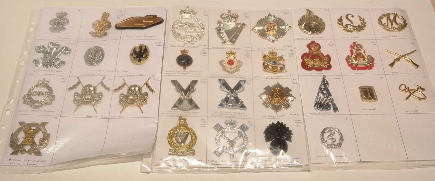Lot 1195 - A collection of 32 Military cap badges relating to Bands.