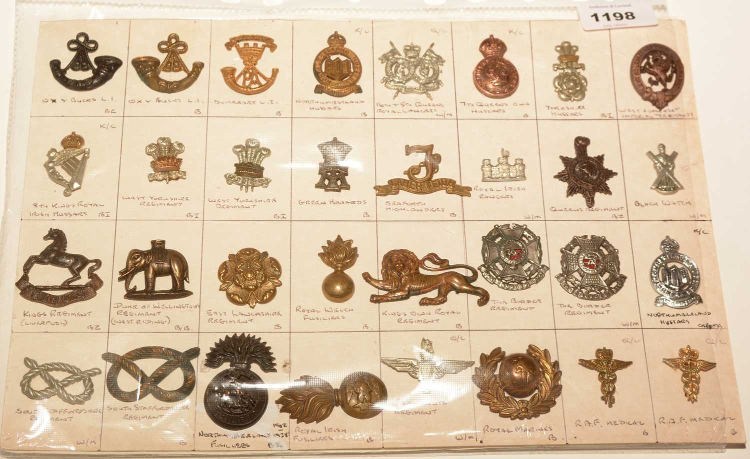 Lot 1198 - A collection of 32 British Military Collar badges.