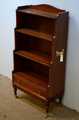 Lot 26 - 20th C campaign style waterfall bookcase.