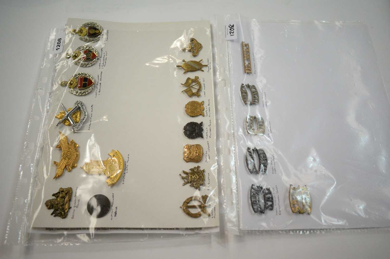 Lot 1208 - A collection of 22 South African cap, collar and shoulder titles.