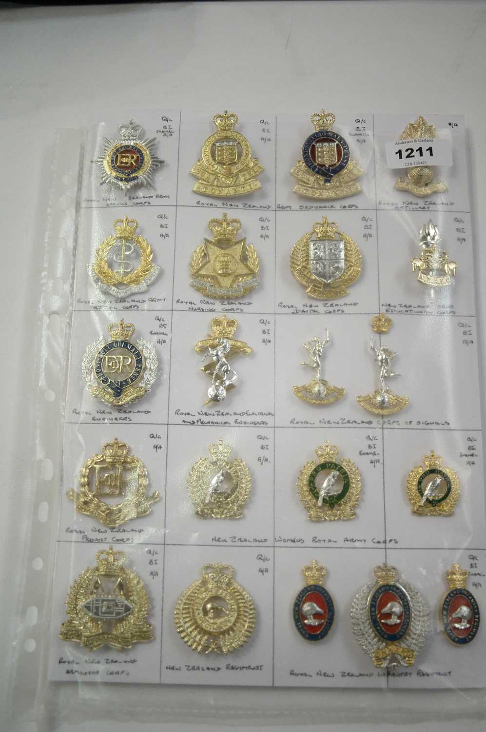 Lot 1211 - A collection of 21 New Zealand Military cap badges.