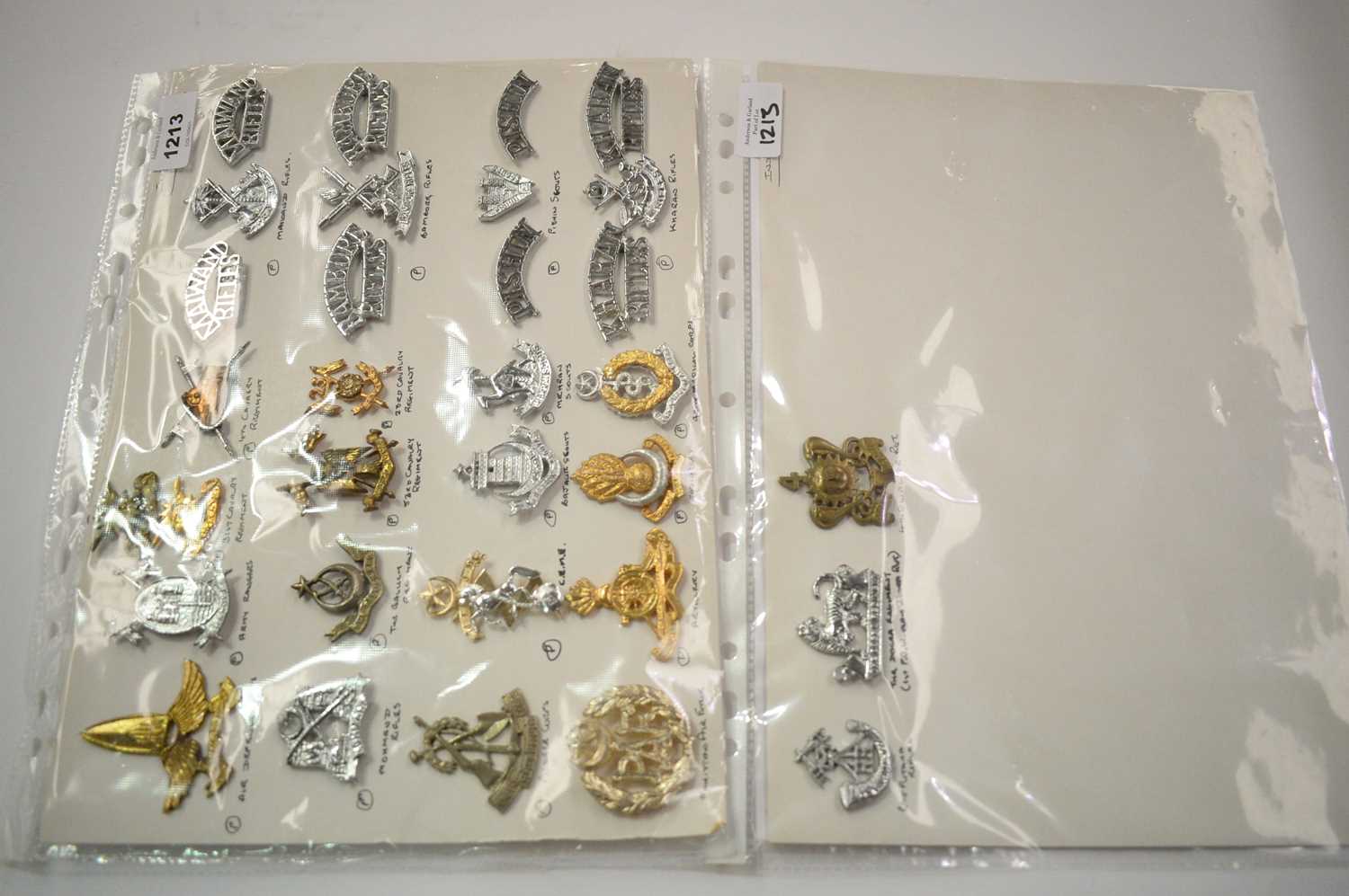 Lot 1213 - A collection of 32 Indian and Pakistani cap badges.